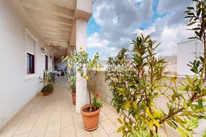 Duplex in centro con terrazzo, box e cantina