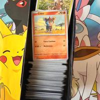 Lotto 600 carte pokemon diversi espnsioni miste