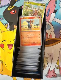 Lotto 600 carte pokemon diversi espnsioni miste