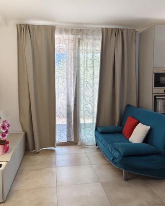 Casa con giardino