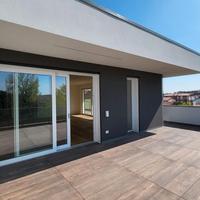 ATTICO grande zona giorno con uscita nel terrazzo