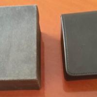 Astucci per orologi. Due pezzi, colori differenti.