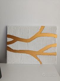 Quadro materico bianco e oro