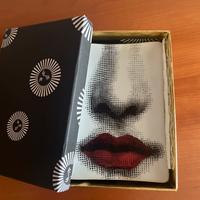 Scuotatasche Fornasetti