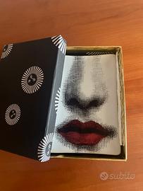 Scuotatasche Fornasetti