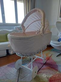 Culla Nanán con ruote e rivestimento panna rosa