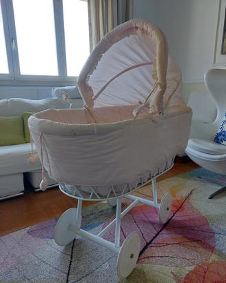 Culla Nanán con ruote e rivestimento panna rosa