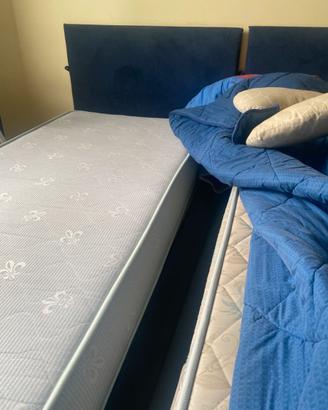 2 letti singoli contenitori