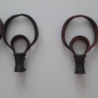 Terminali per bastoni tende