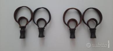 Terminali per bastoni tende