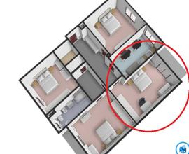 Ampia camera in appartamento ristrutturato