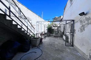 Abitazione al P.T. con giardino, garage, cantina