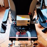 Carrozzina pieghevole elettrica