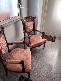 Coppia di poltrone vintage in legno e tessuto