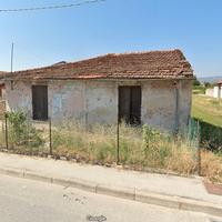 Casolare con capanno e terreno edificabile