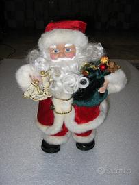 Babbo natale che canta e balla alto 35 cm