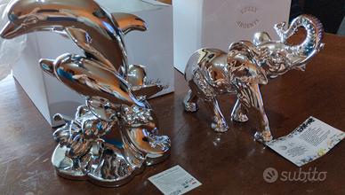 eleganti sculture artigianali.argento e Swarovski