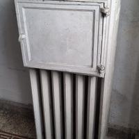 calorifero vintage , in ghisa con portavivande