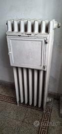 calorifero vintage , in ghisa con portavivande