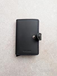 mini portafoglio SECRID nero pelle NUOVO