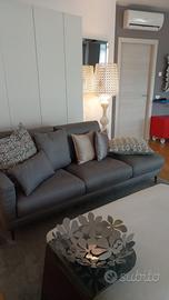 Divano tessuto alcantara grigio