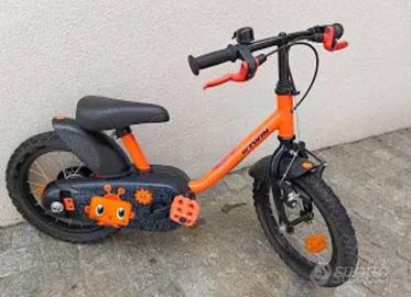 Bici Btwin 14” arancione e rotelle