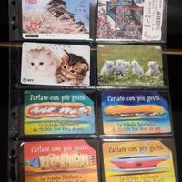 66 schede telefoniche con custodie di plastica