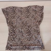 maglia aderente con scollatura sulla schiena