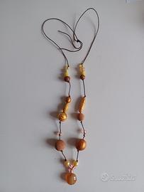 collana dorata ceramica