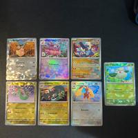 Lotto 7 carte pokemon evoluzioni prismatiche holo