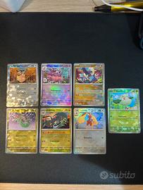 Lotto 7 carte pokemon evoluzioni prismatiche holo