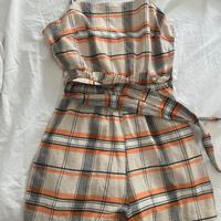 Tutina con cerniera laterale