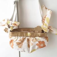 Borsa Zippo oro femminile con zip a fiore