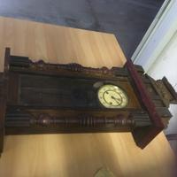 Orologio a pendolo a muro