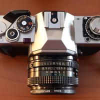 Canon AV1 con duplicatore di focale e flash