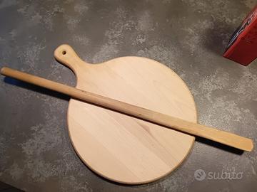 Tagliere e mestolo per polenta