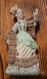 statuina in porcellana 