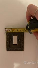 Copripresa vintage in ottone