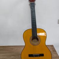 Chitarra, pianola, poggia piede e leggio.