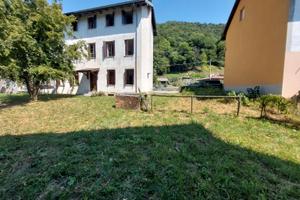 Terratetto plurifamiliare + cascina Travesio