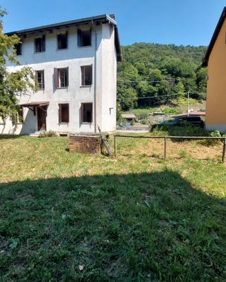 Terratetto plurifamiliare + cascina Travesio