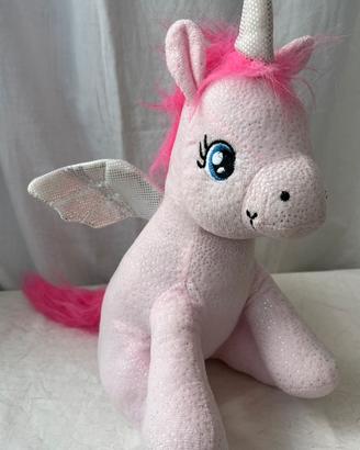 Unicorno seduto peluche
