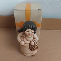 Presepe Thun donna con frutta Champagne