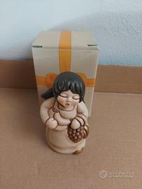 Presepe Thun donna con frutta Champagne