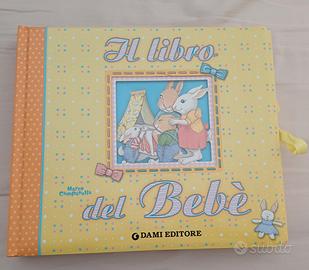 Libro del bebè + L'album della prima Comunione 