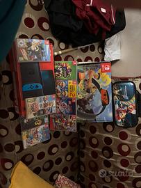 Nintendo switch  + 8 giochi e custodia