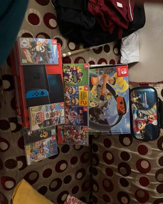 Nintendo switch  + 8 giochi e custodia