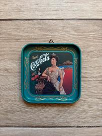 Sottobicchiere in latta Coca-Cola 1927 - 1977.