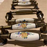 Maniglie antichi  in ottone rifiniti in ceramica