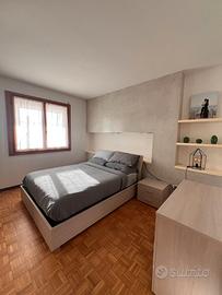 Camera con bagno privato in appartamento condiviso